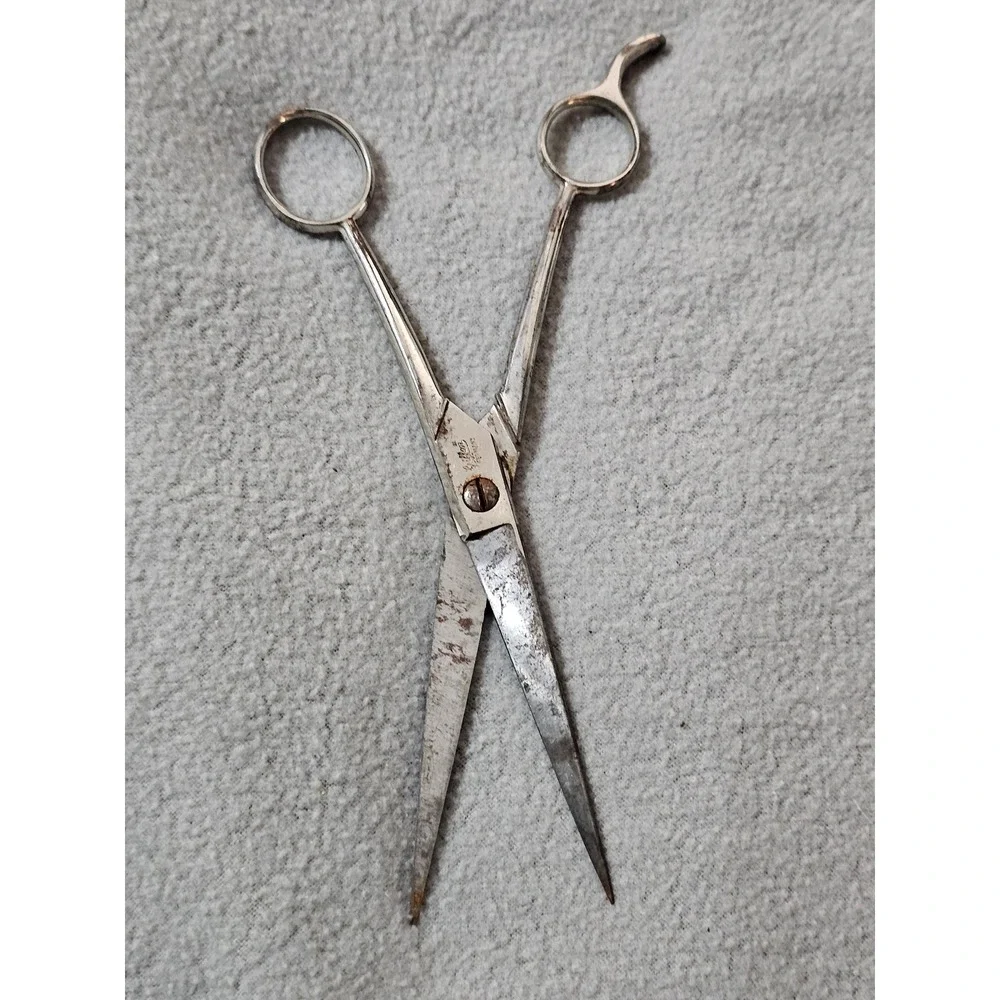 vintage silver metal hair scissors manufactured by Griffon in Germany collect
